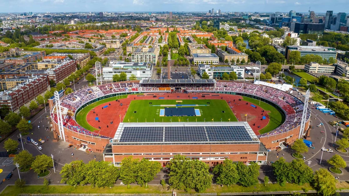 Olympisch_Stadion___Gymnaestrada___vermelden_aerialsbyaero-scaled